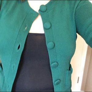 Retro style cardigan sweater with covered buttons